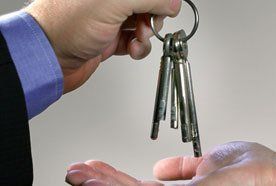 A set of keys being handed over to a new tenant