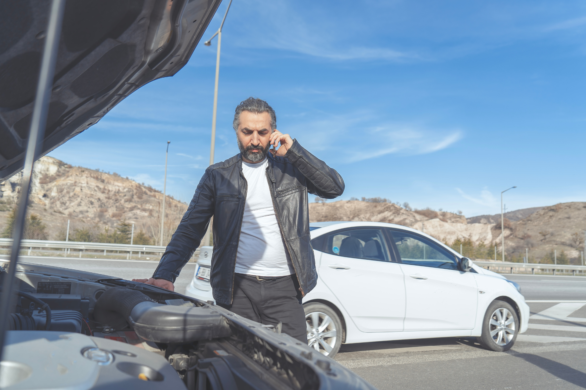 Car Breakdown on a Busy Highway