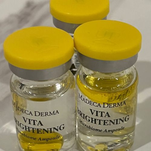 Three bottles of madeca derma vita brightening microbiome ampoules