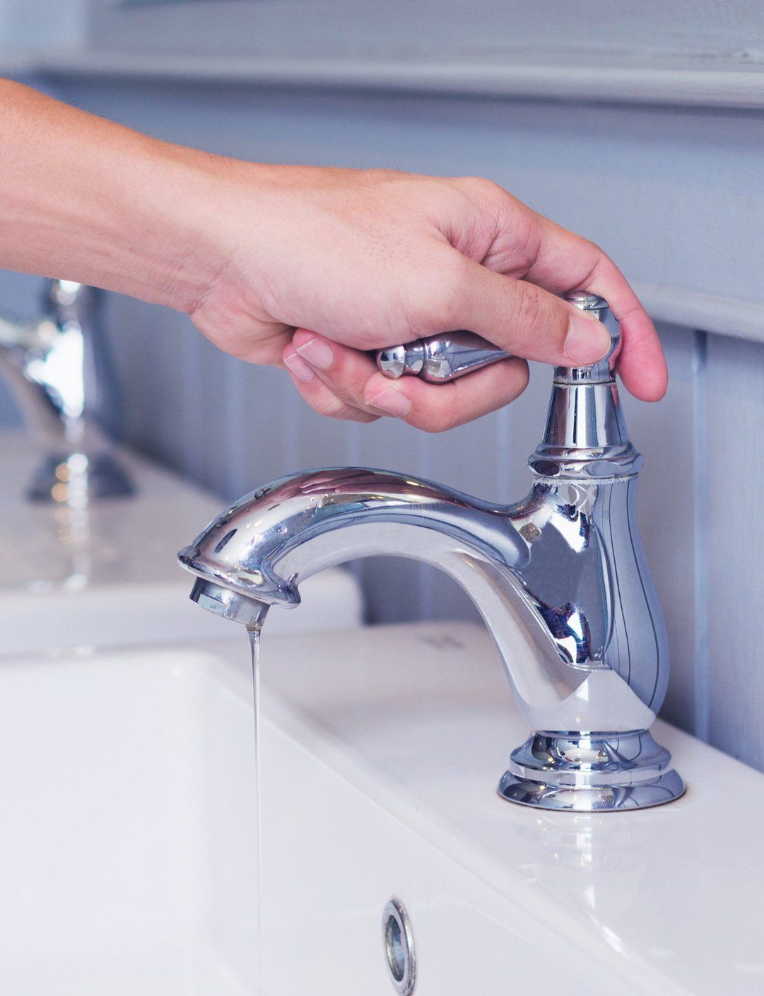 Professional Plumber — Turning on the Faucet in Fredericksburg, VA