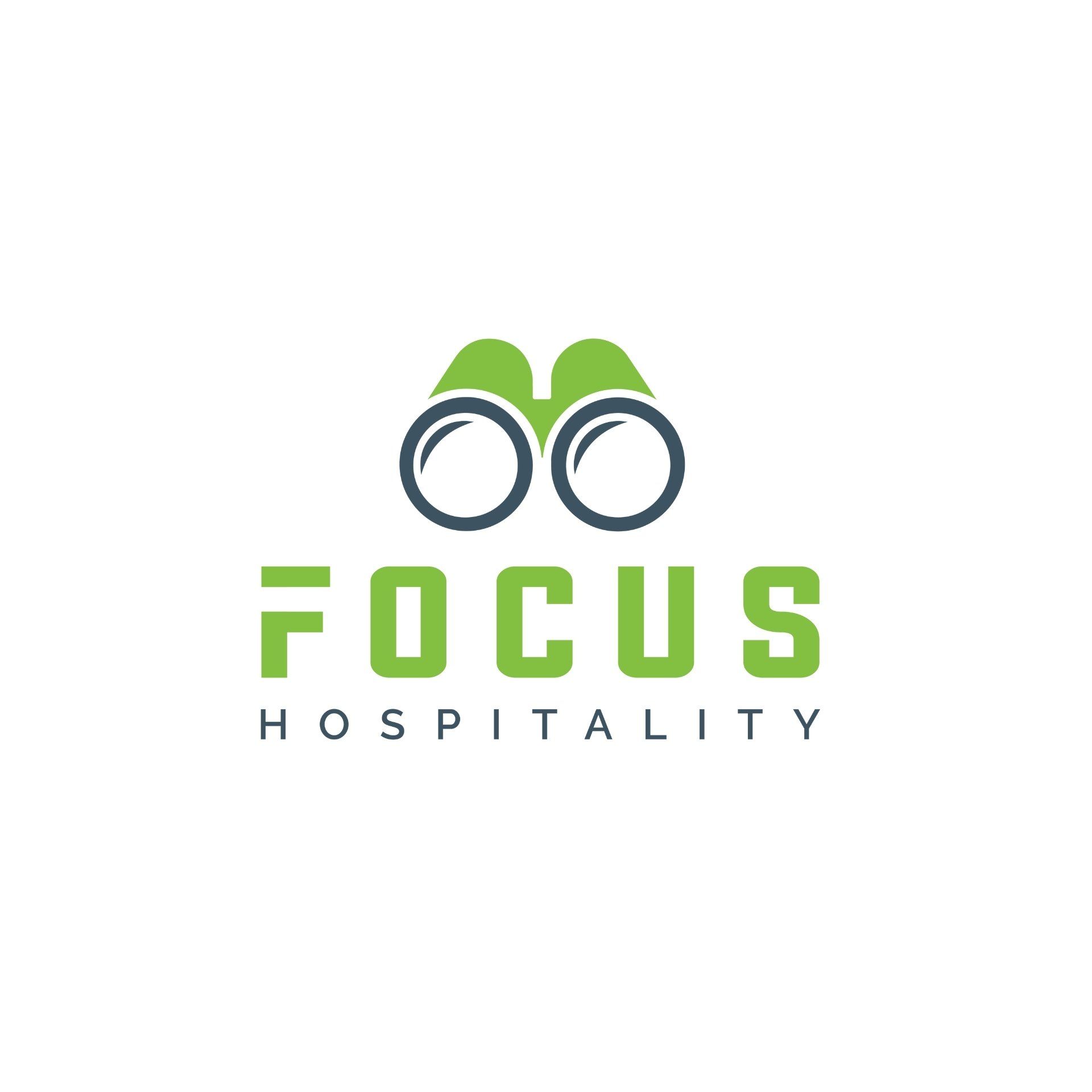 A green and blue logo for focus hospitality