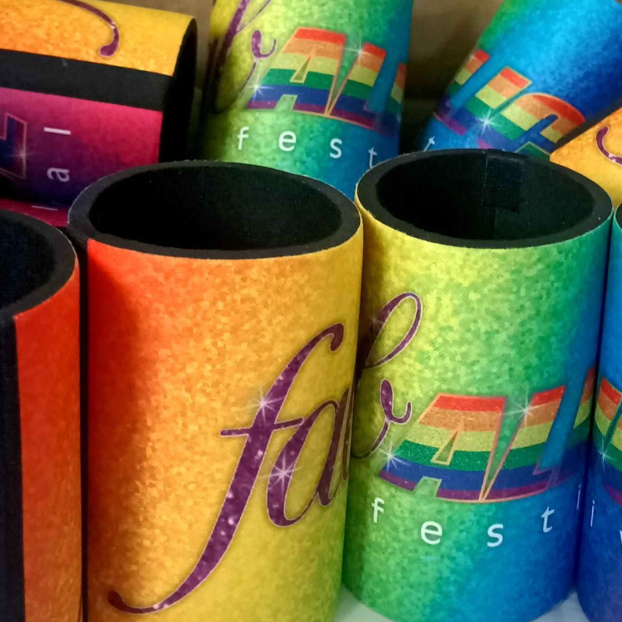 a Bunch of Colourful Can Holders With the Word Fest on Them — Pinpoint In Alice Springs, NT