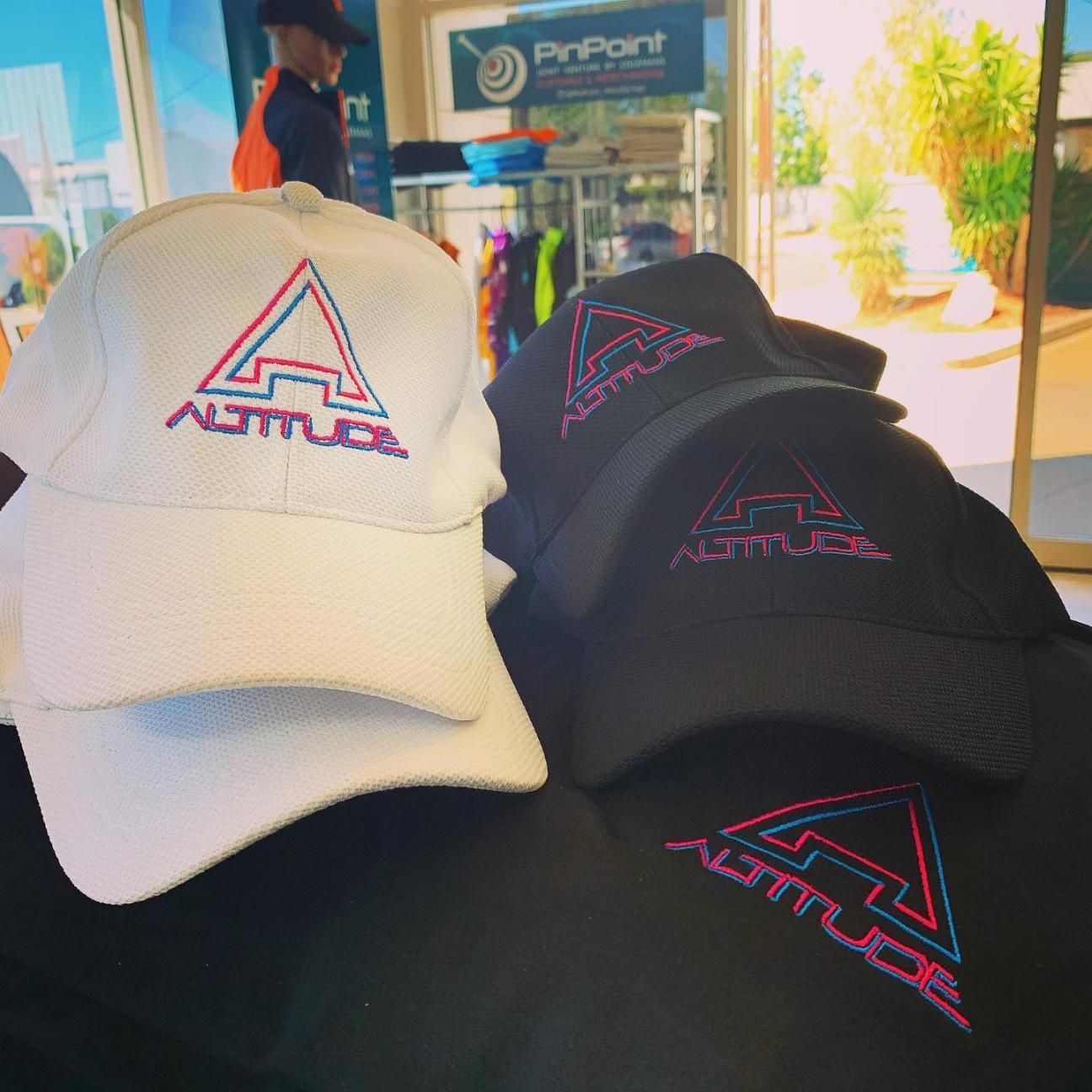 Three Hats Are Stacked on Top of Each Other on a Table — Pinpoint In Alice Springs, NT