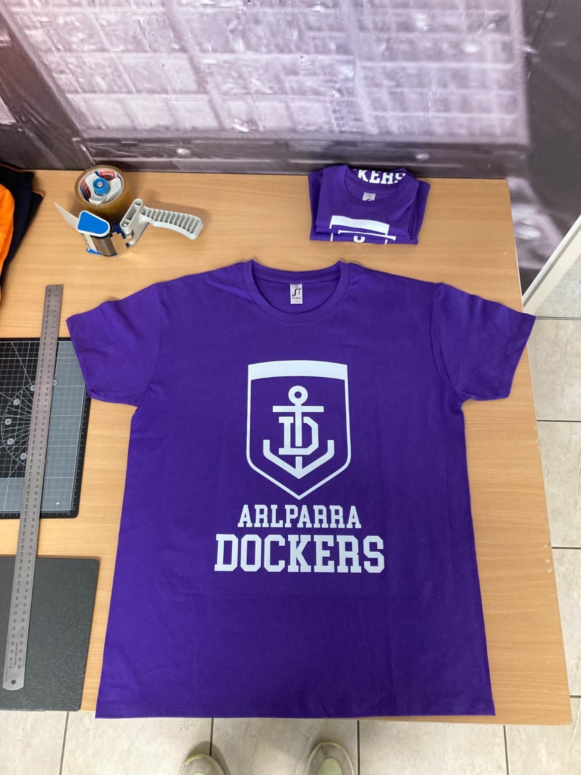 a Purple T-shirt That Says Arlparra Dockers on It — Pinpoint In Tennant Creek, NT