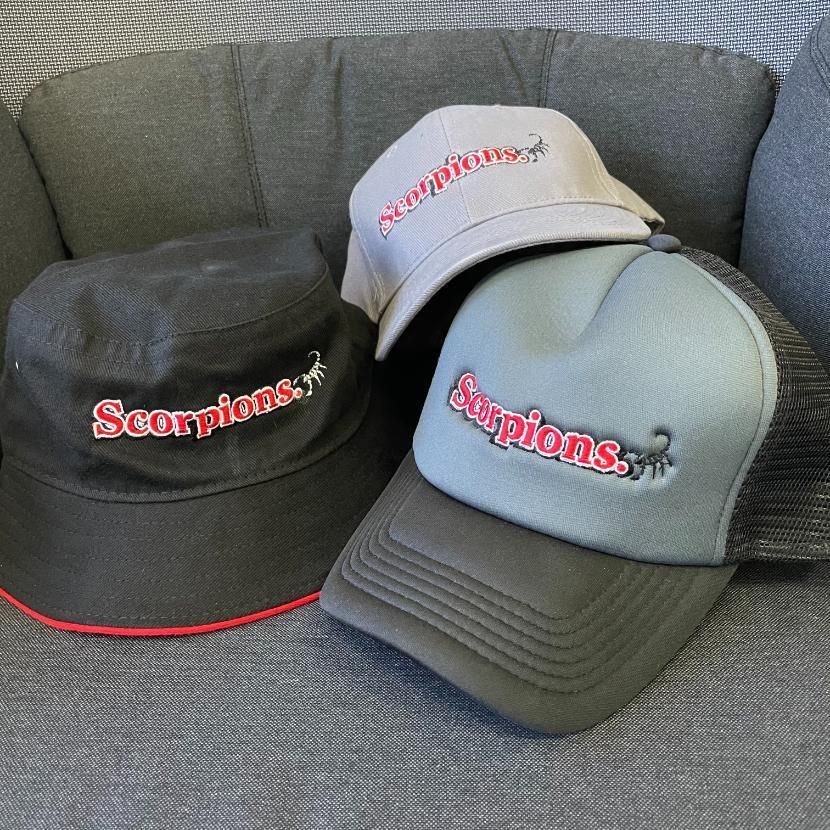 Three Hats With the Word Scorpions on Them — Pinpoint In Katherine, NT