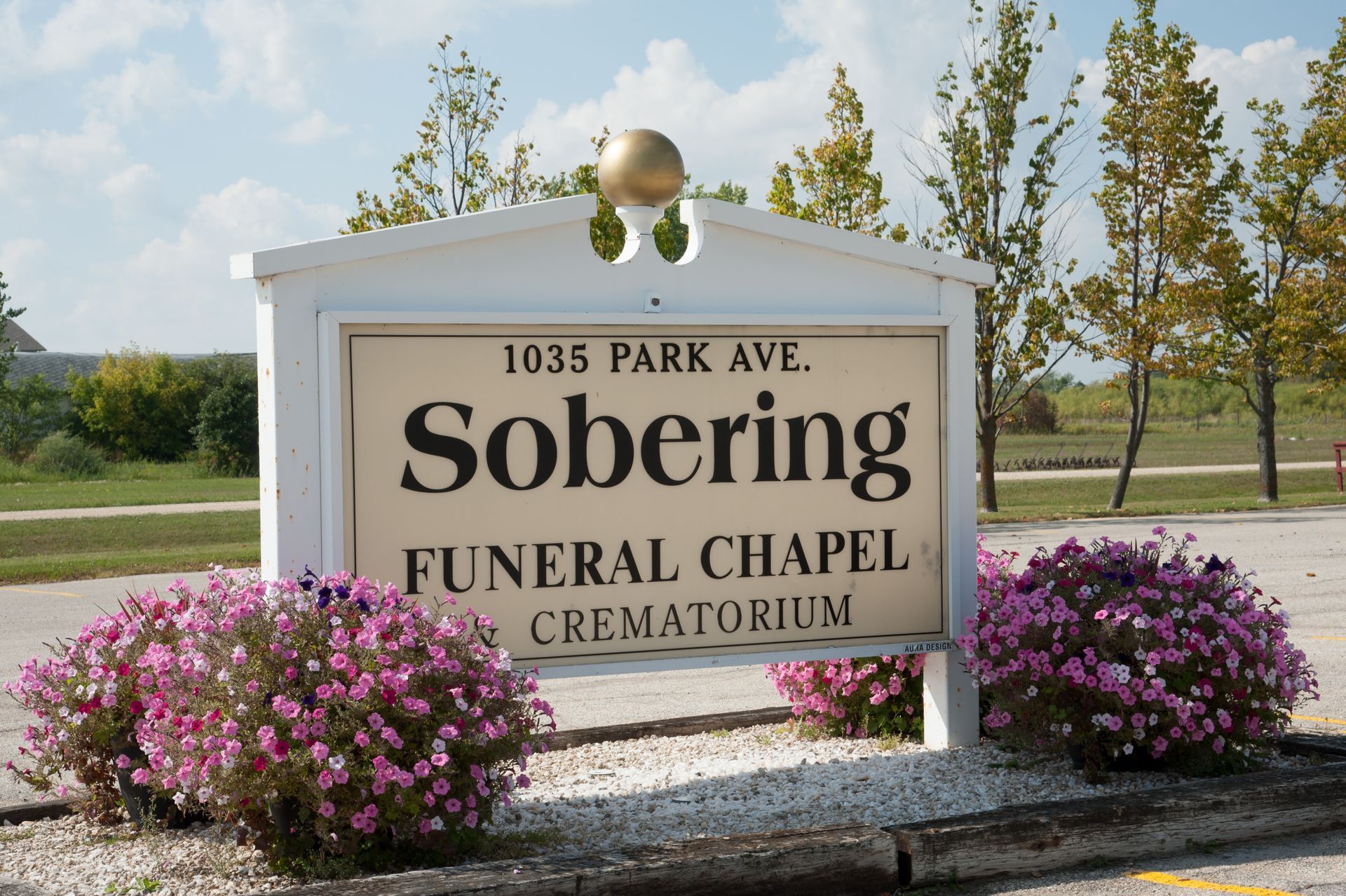 a sign for 1035 park ave. sobering funeral chapel crematorium