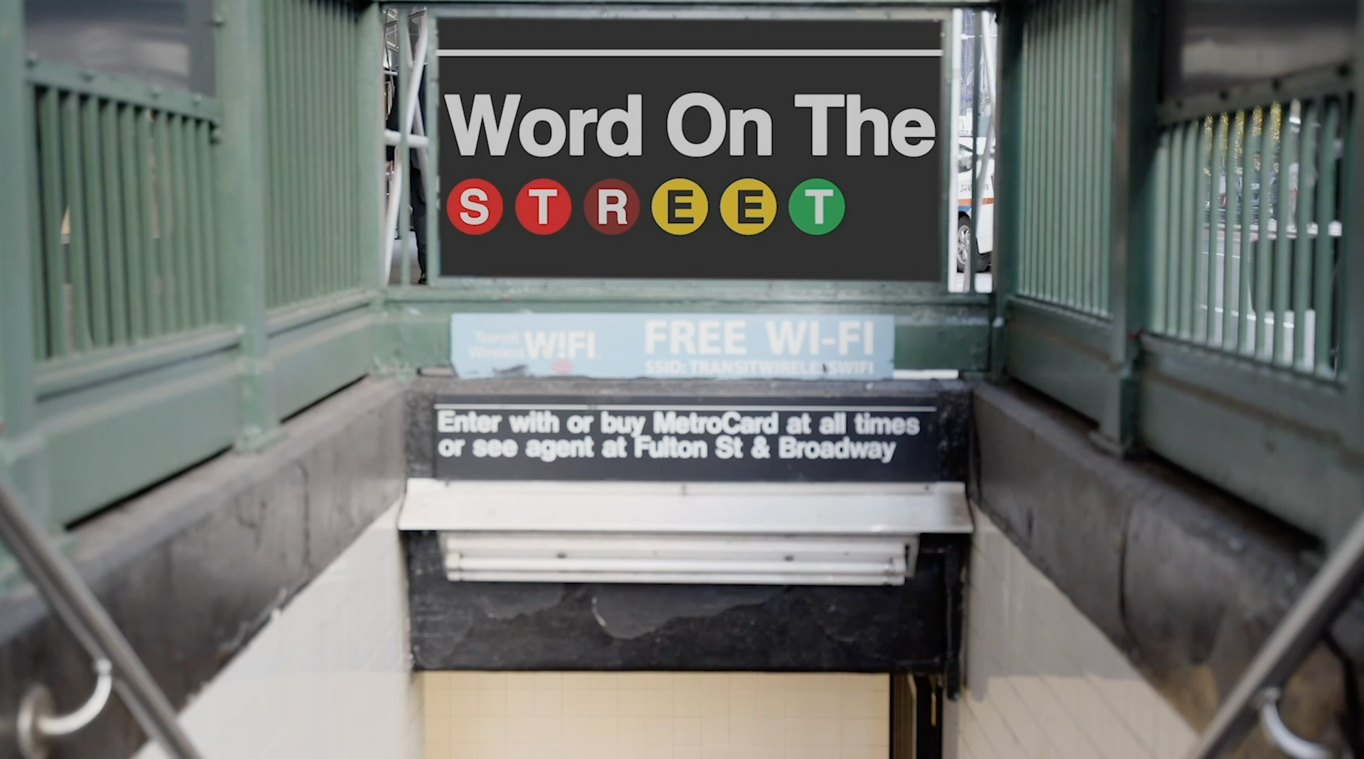 A subway station with a sign that says word on the street