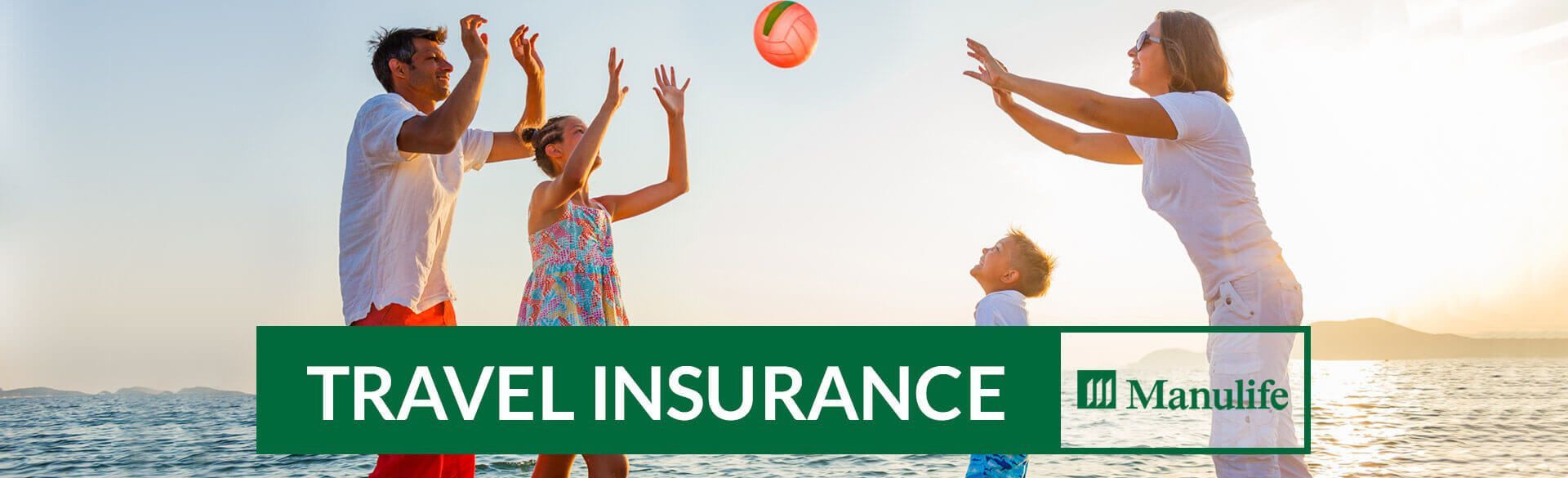A family is playing with a beach ball on the beach.
