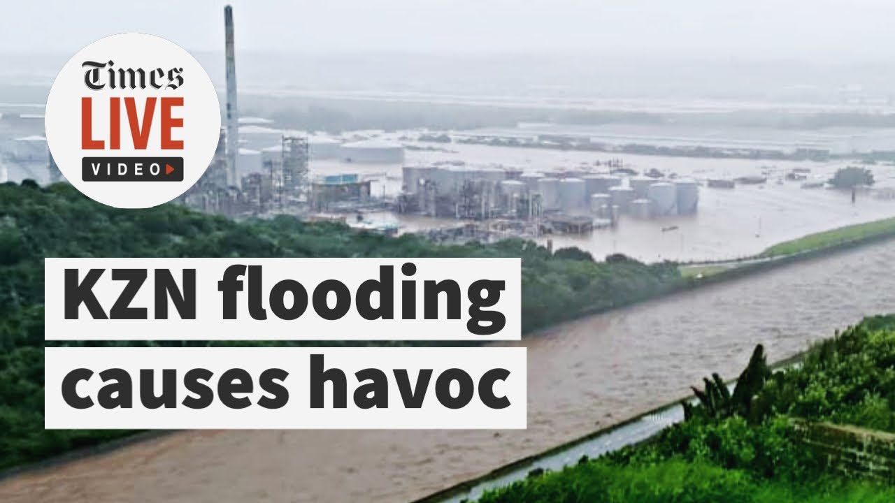 A picture of a river with the words kzn flooding causes havoc on it.