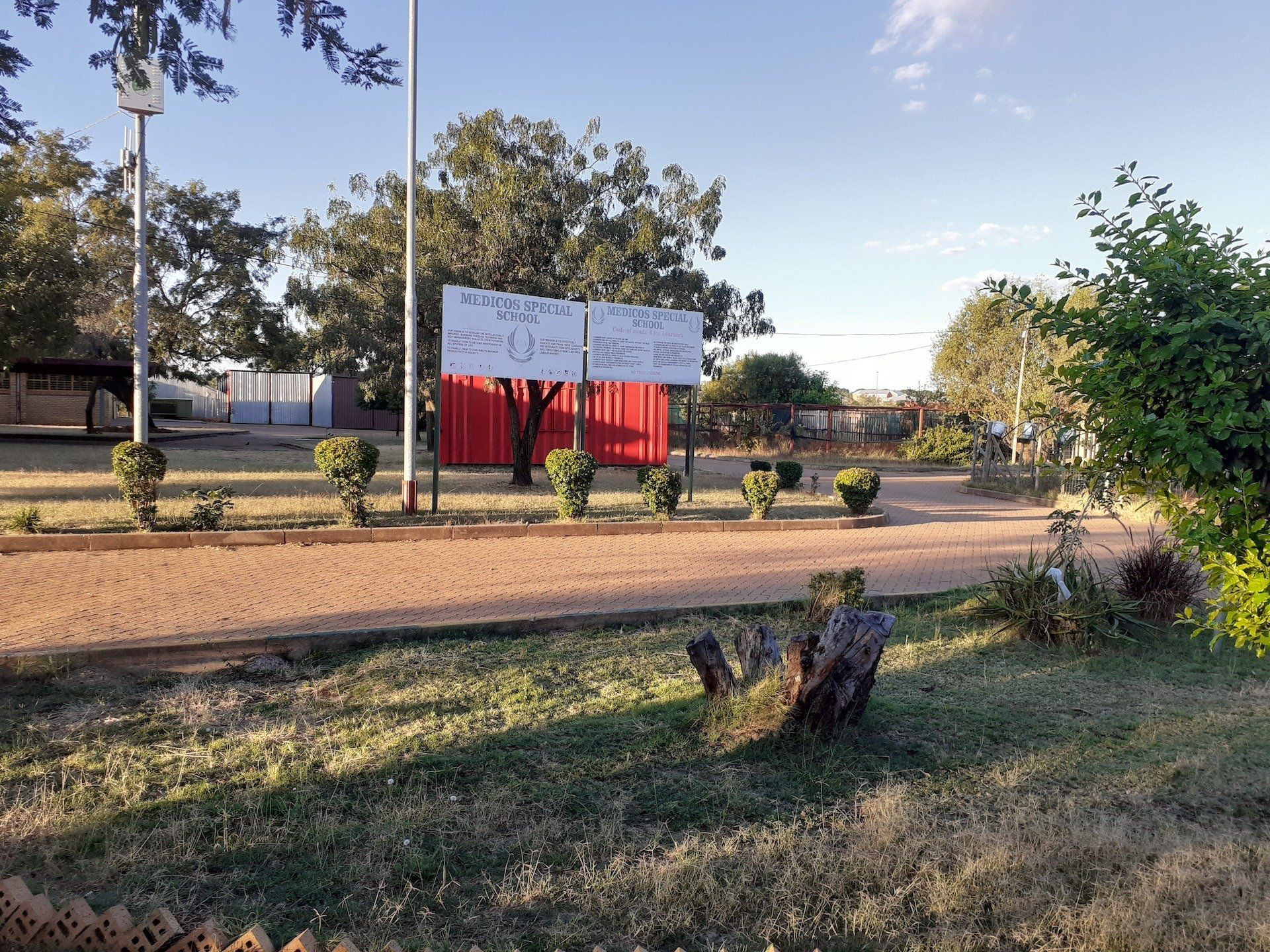A park with a sign that says ' a ' on it