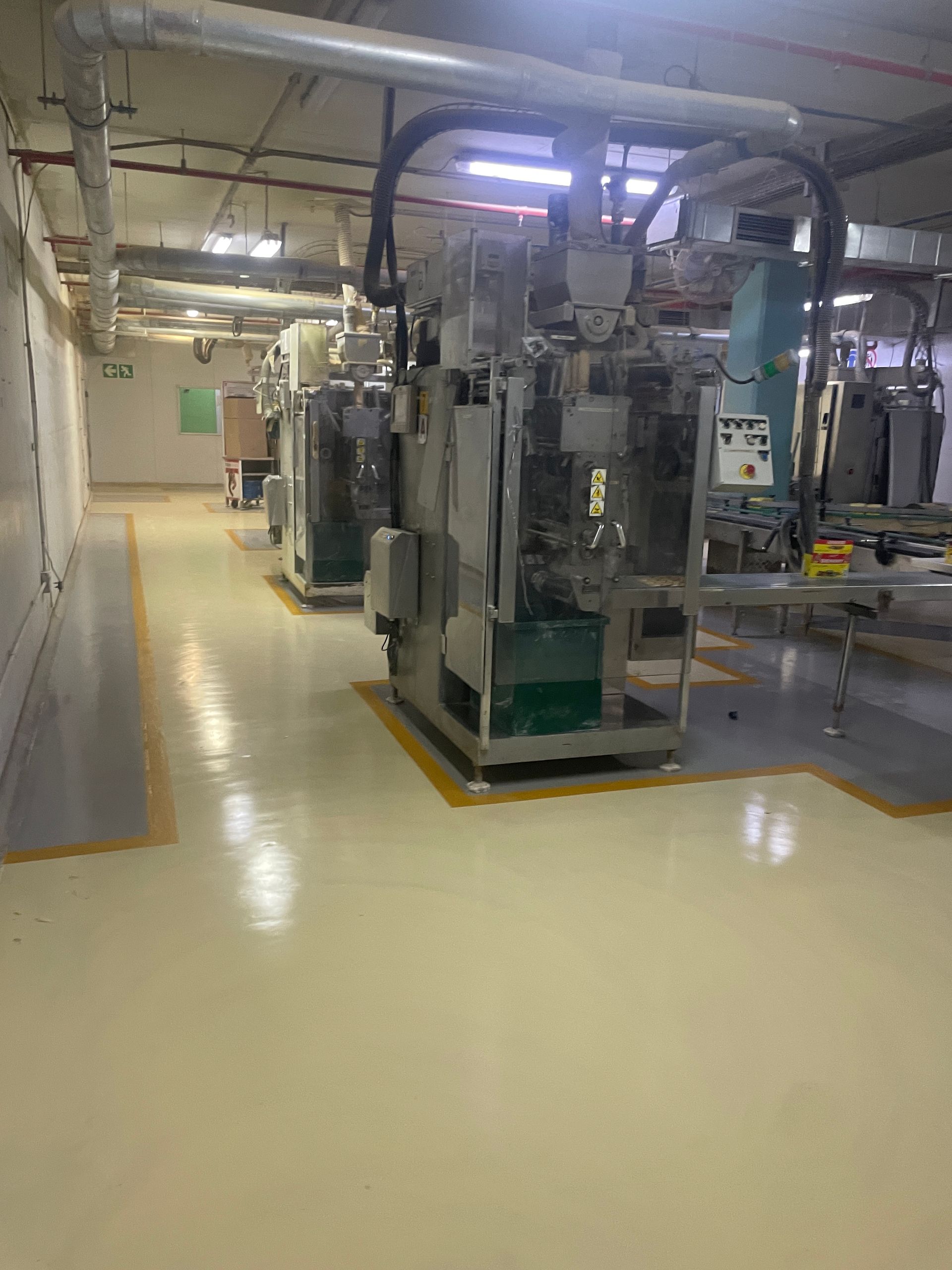 A large room with a lot of machinery in it.