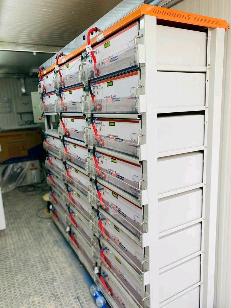 A bunch of batteries are stacked on top of each other