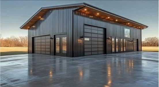 A large metal garage with a lot of windows and doors.