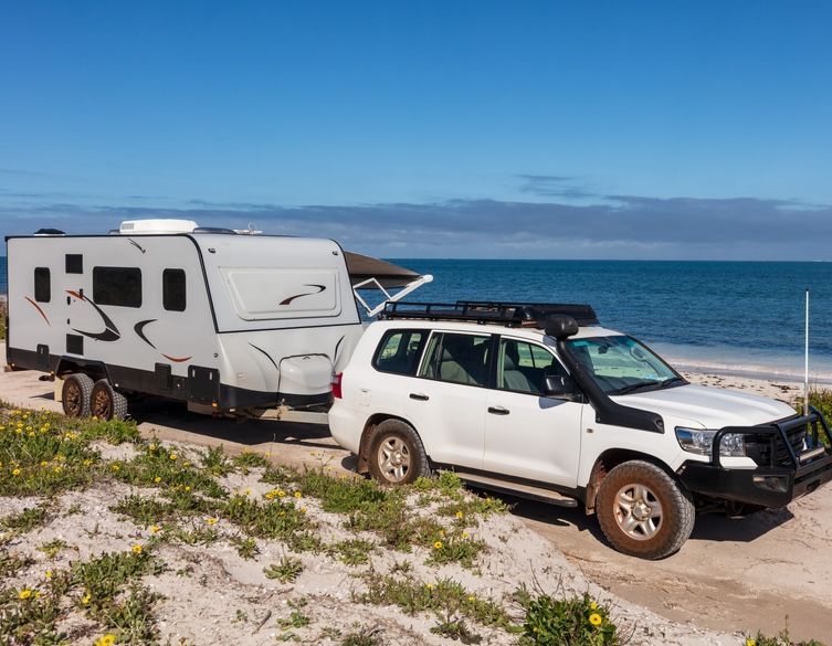 4WD and Caravan On Sand — AEQ - Auto Electrics QLD in Woombye, QLD