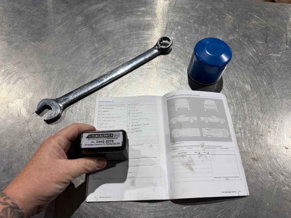 Stamping Logbook Servicing Book — AEQ - Auto Electrics QLD in Woombye, QLD