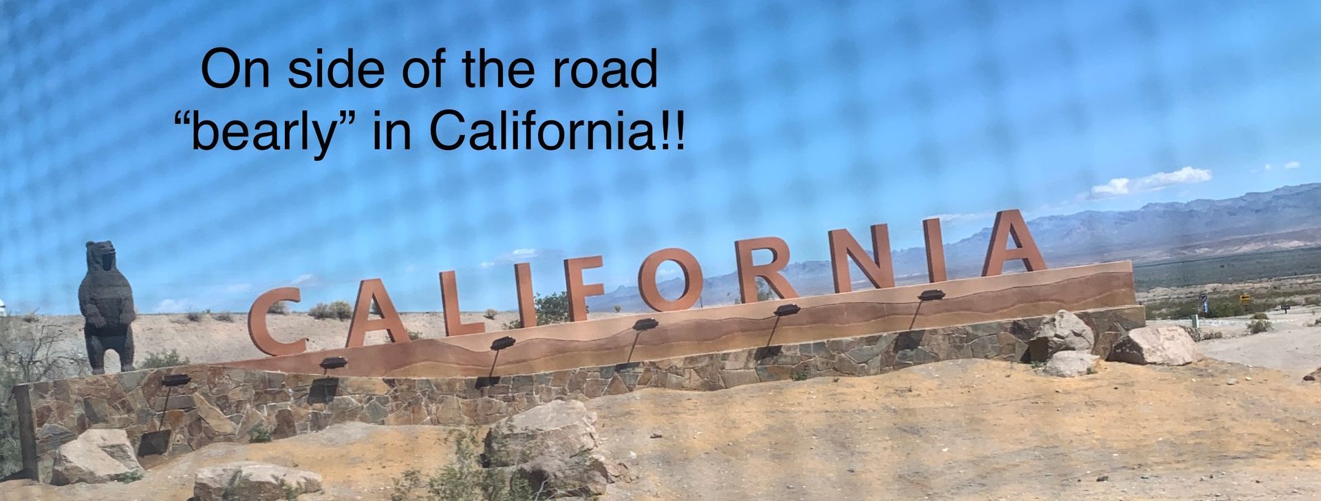 A sign that says california on the side of the road