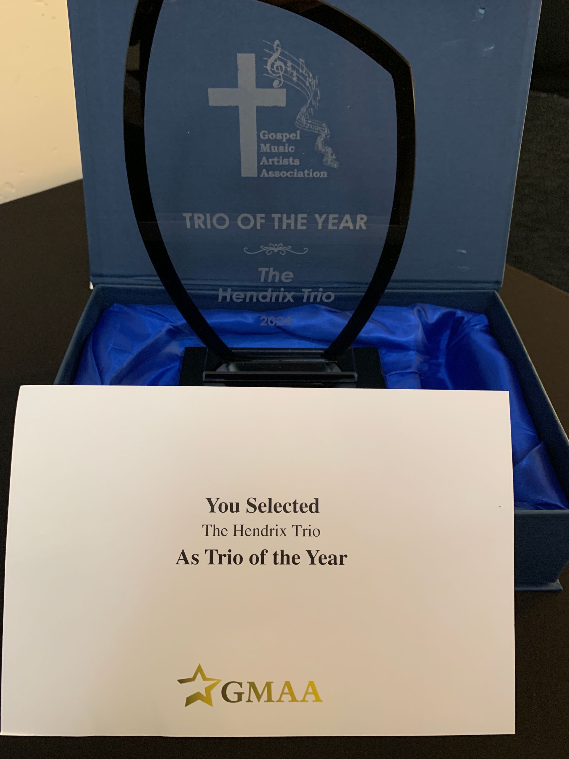 A trio of the year award is in a blue box