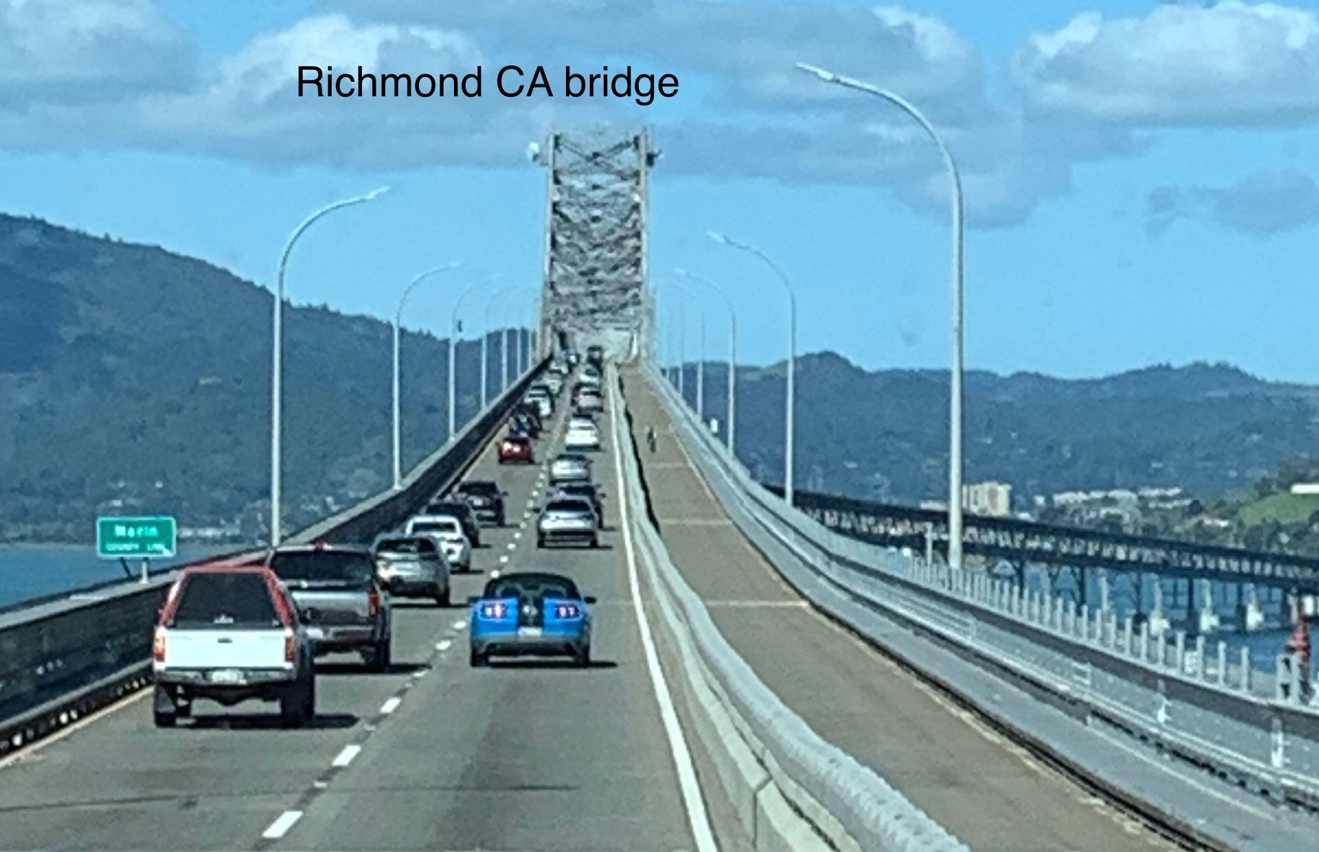 Cars are driving on a bridge in richmond california