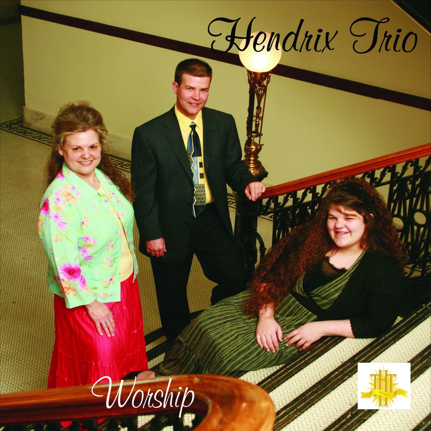 Hendrix Trio album cover: Three people on stairs,