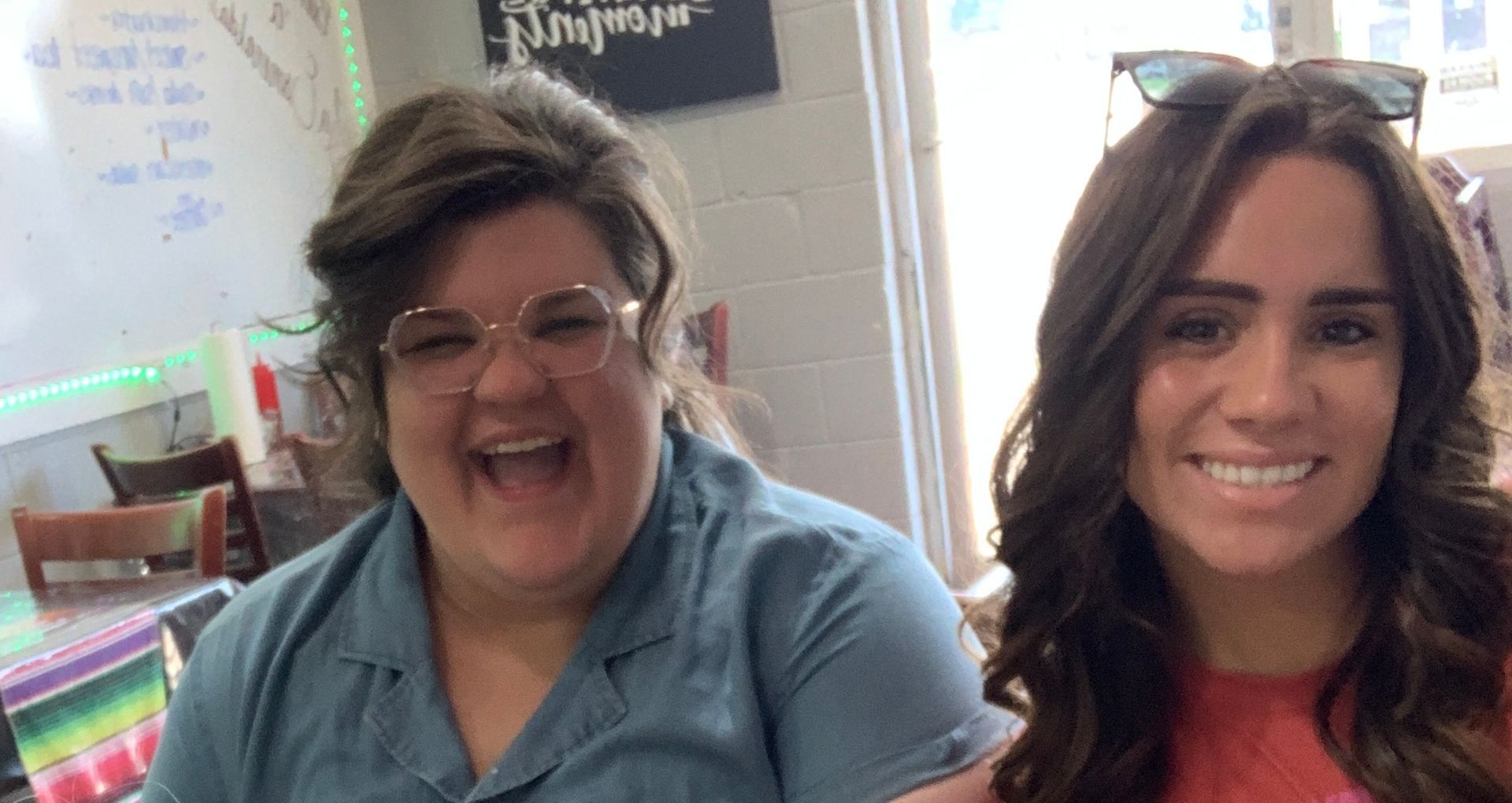 the hendrix trio singing on stage with gaither style choir