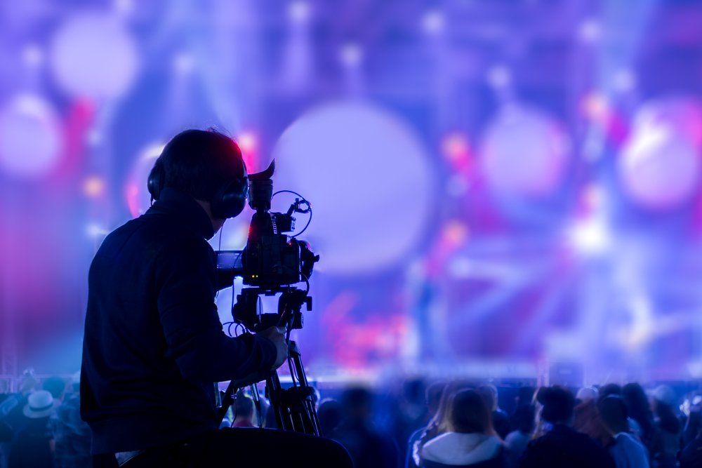 camera man filming a live video production concert