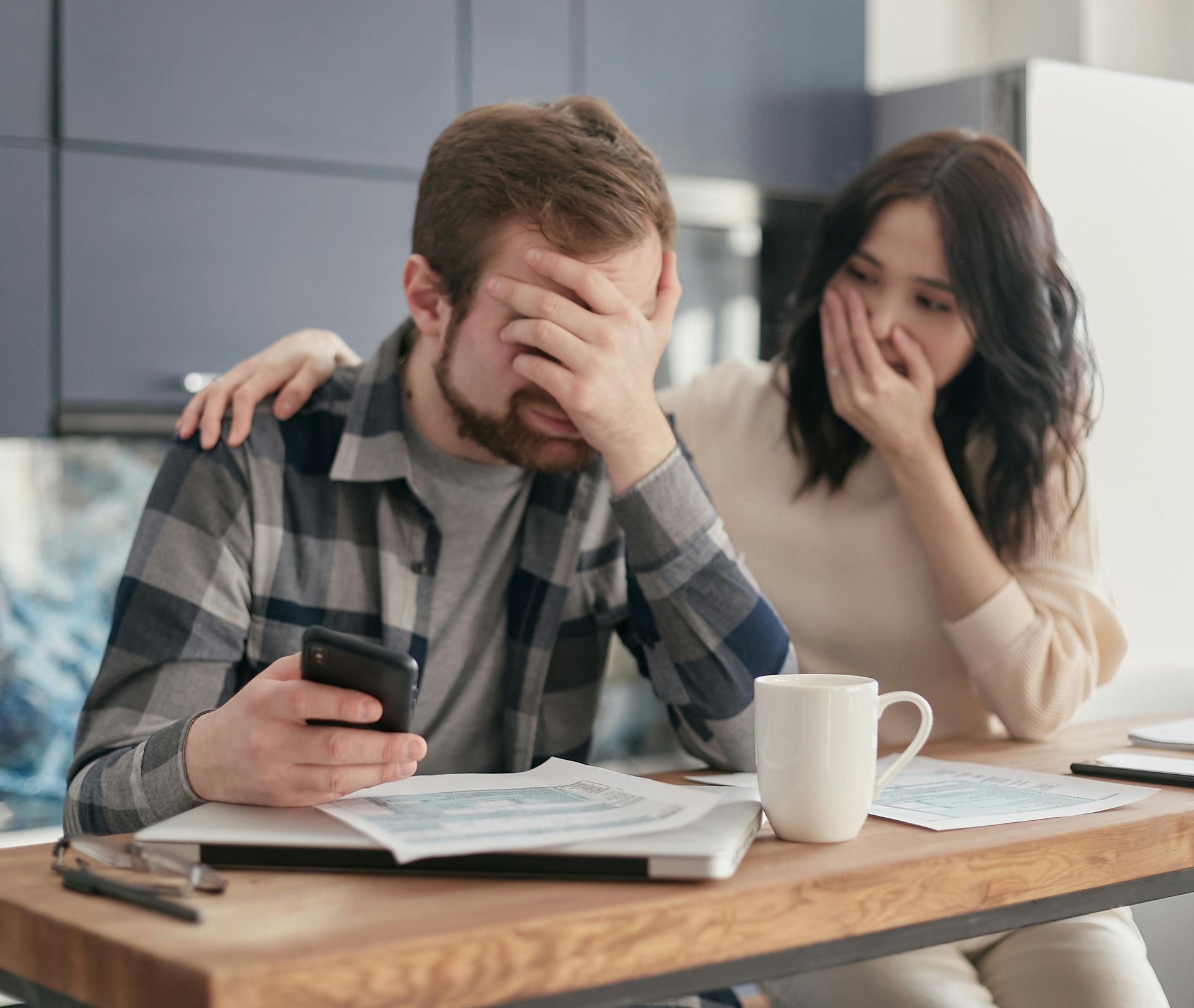 a man and a woman looking stressed