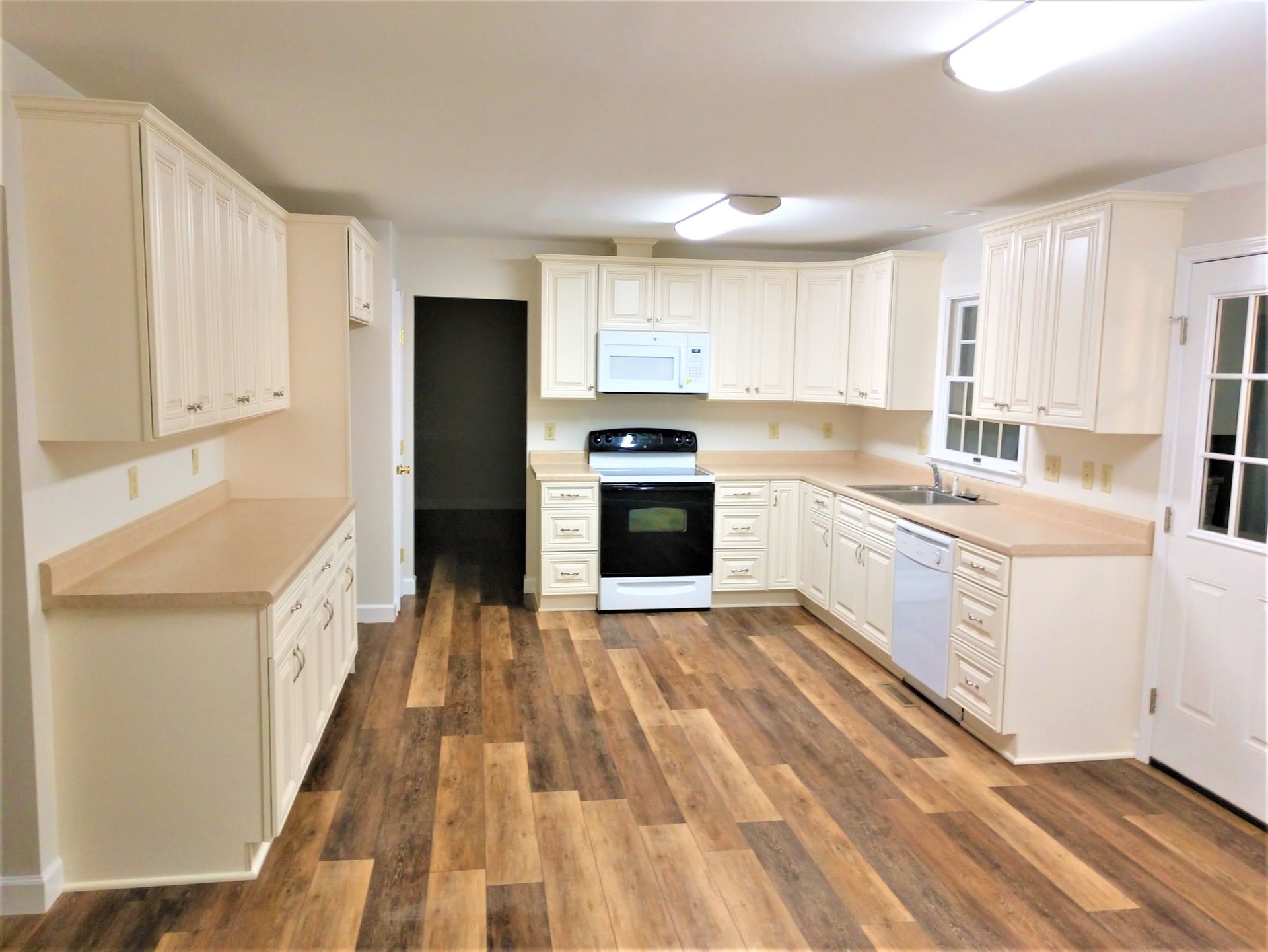 A Kitchen With White Cabinets — Glade Hill, VA — Southern VA Construction