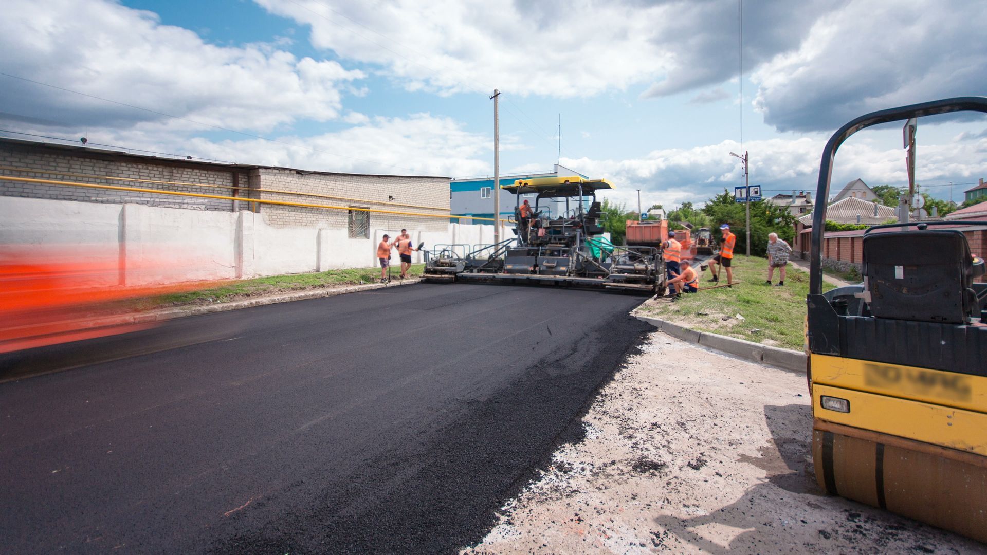 Asphalt Paving a Road — Riverton, UT — Bison Commercial Services Asphalt Paving a Road — Riverton, UT — Bison Commercial Services