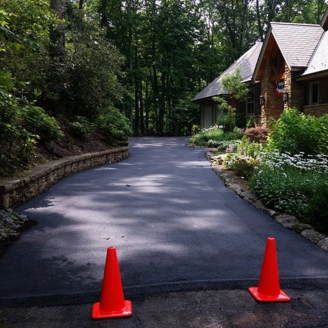 A New Paved Road With Orange Cones- Zionville, North Carolina - Sterling McDiarmid Paving Co., Inc.