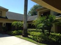 Residential Cleaning — Side View House With Tree  in Myers, FL