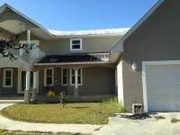 Modern House— Beautiful House With Garage in Front View  in Myers, FL