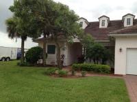 Homes — House Side View With Three Windows in Rooftop's  in Myers, FL
