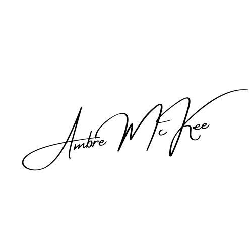 A black and white signature of ambre mckee free on a white background.