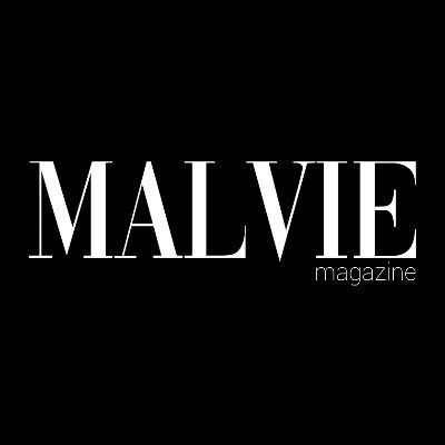 The logo for malvie magazine is white on a black background.