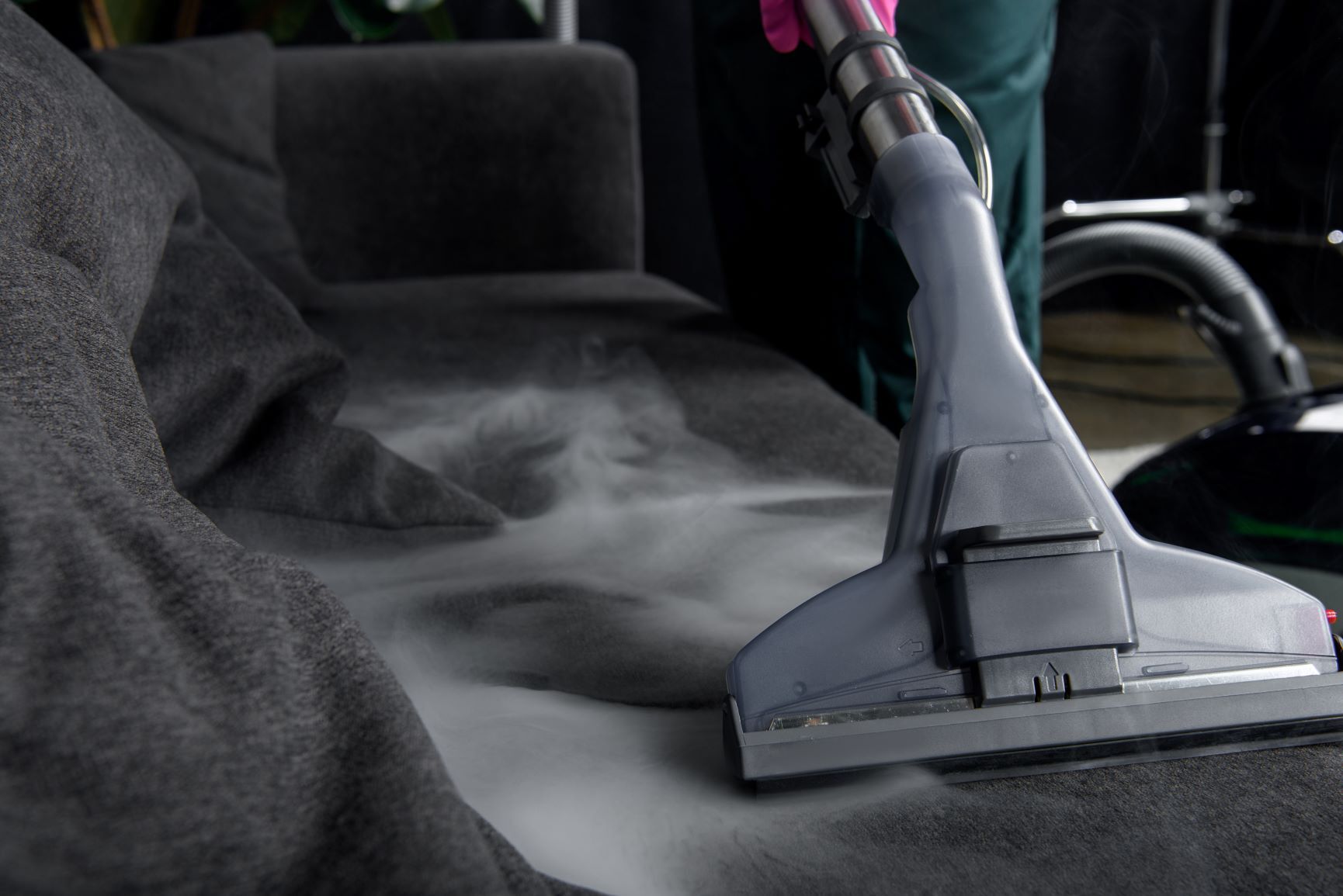 Professional upholstery cleaning service demonstration.