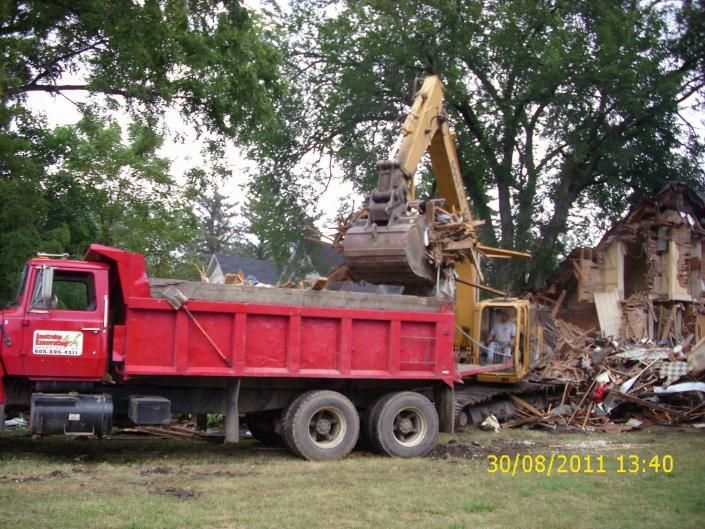 Loading & hauling & cleaning things up on this job.
