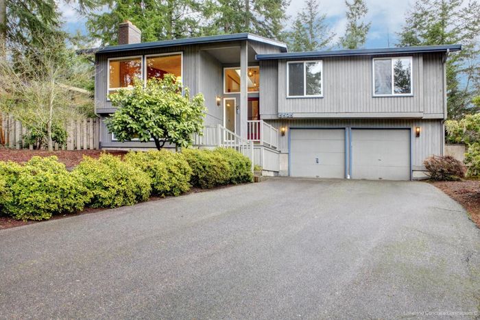 container look like house with concrete driveway