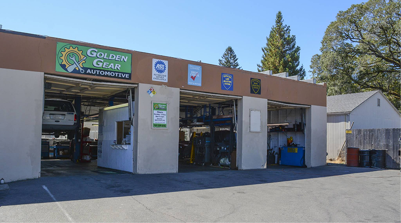 Auto repair shop with open bays, 