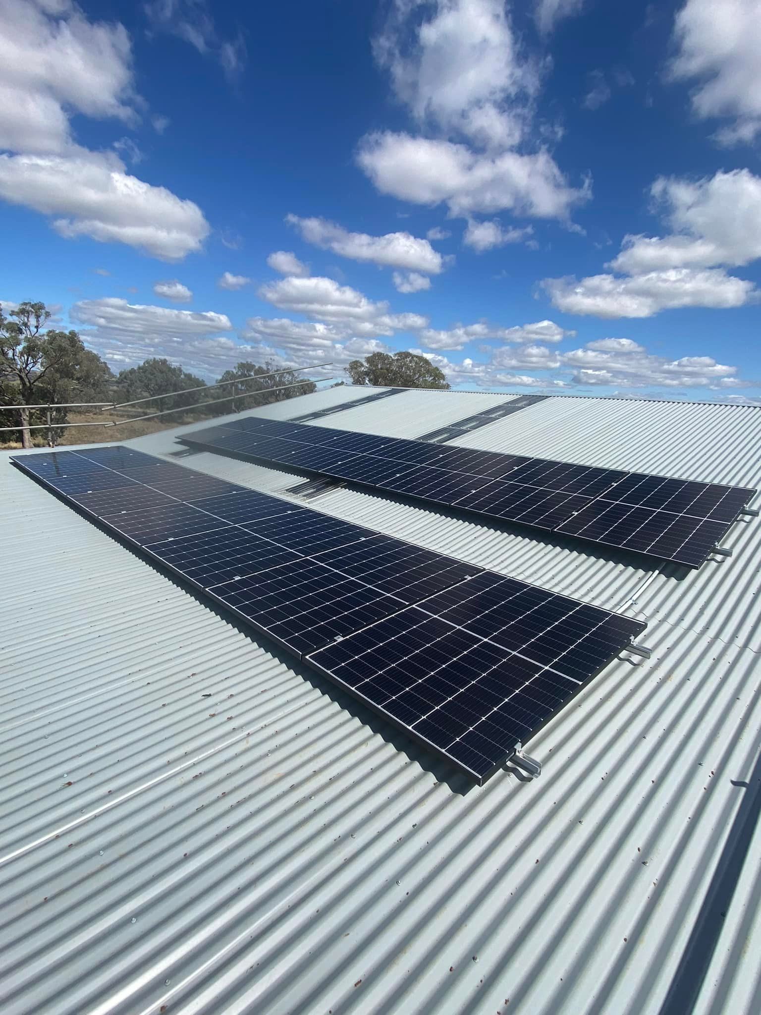 Solar Panels on A Corrugated Metal Roof — Canobolas Air in Parkes, NSW