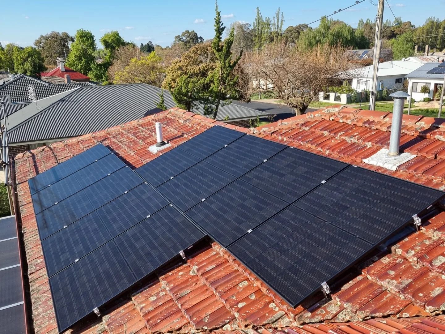 Solar Panels Installed on A Red-Tiled Roof of A Residential Home — Canobolas Air in Mudgee, NSW