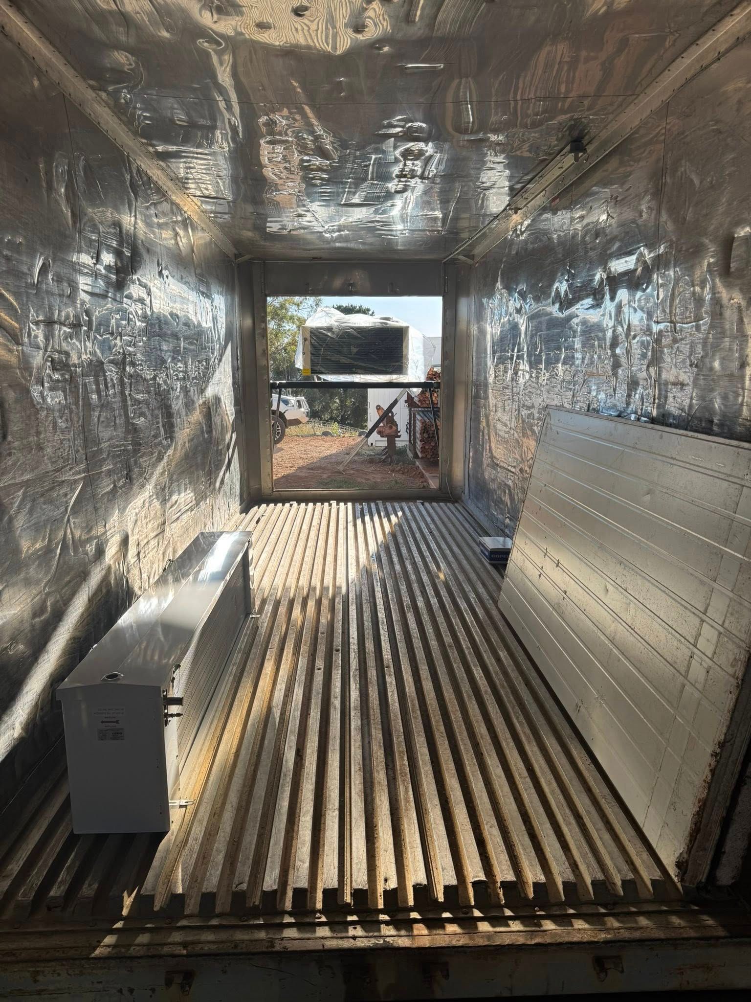 Interior View of A Silver, Empty Refrigerated Truck — Canobolas Air in Dubbo, NSW
