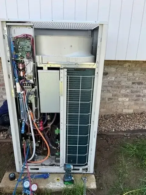 Open Outdoor HVAC Unit with Exposed Components — Canobolas Air in Orange, NSW