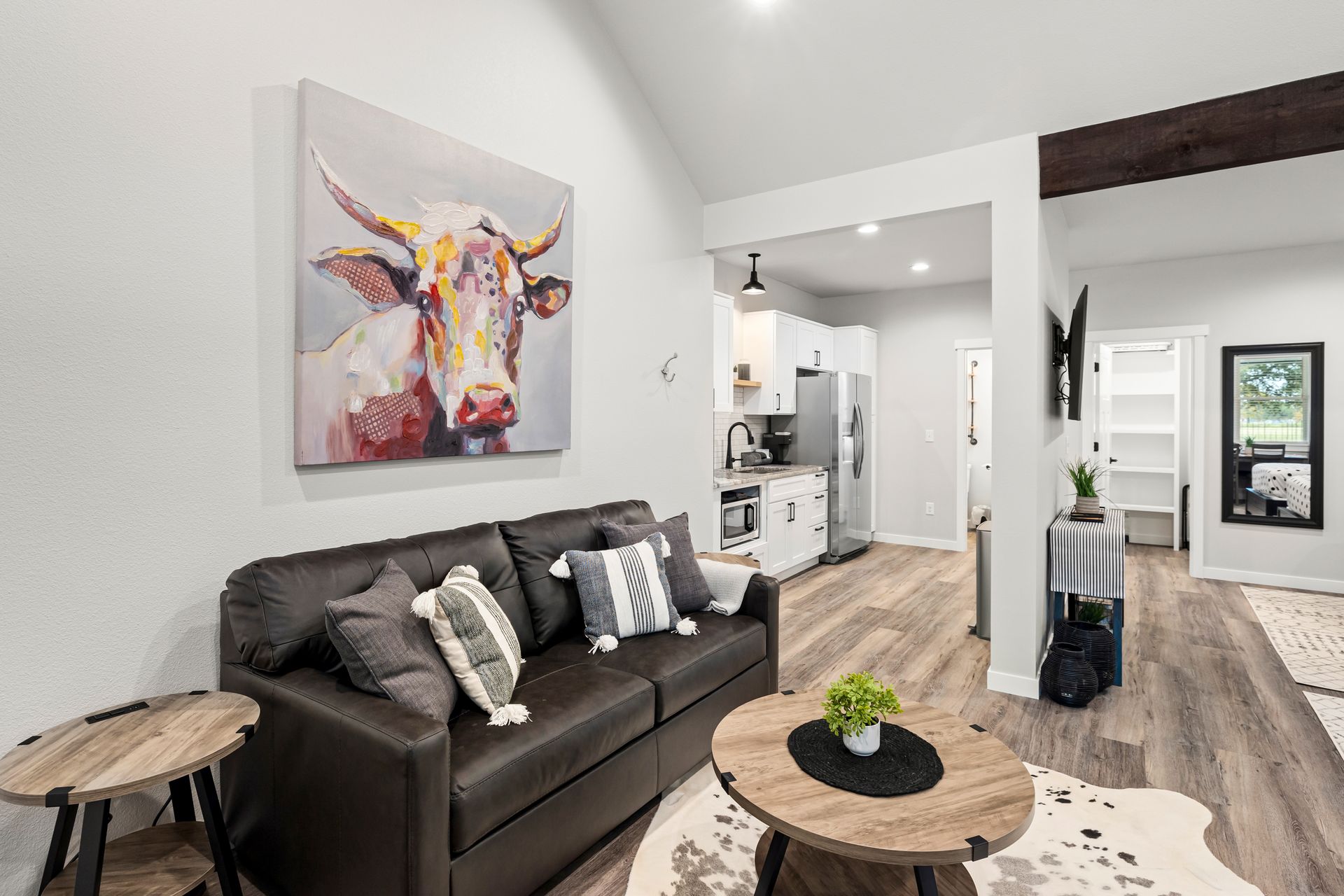 Cute cow pic above sleeper sofa in Bungalow 1.