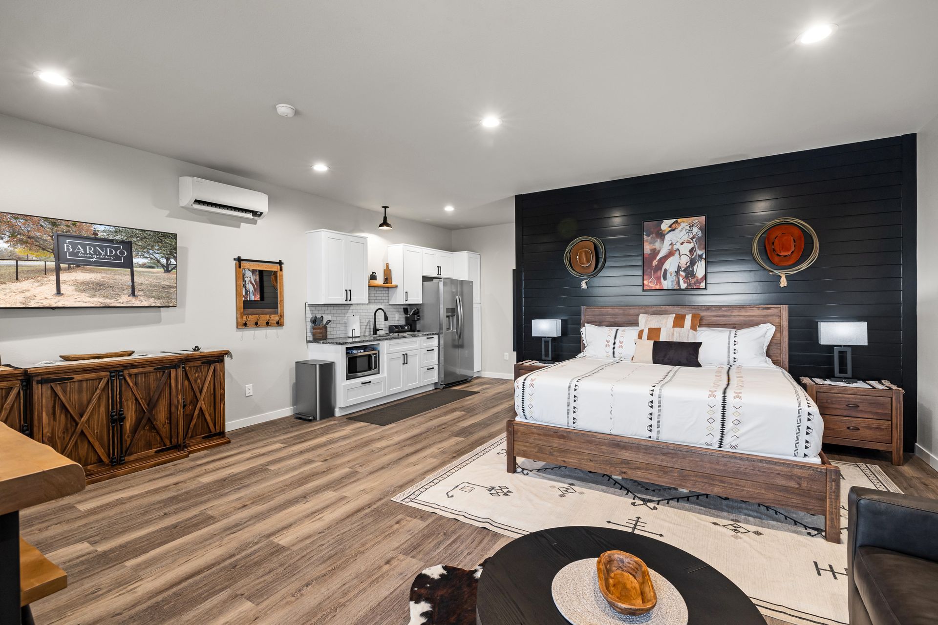 There is a large bed in the middle of the room.