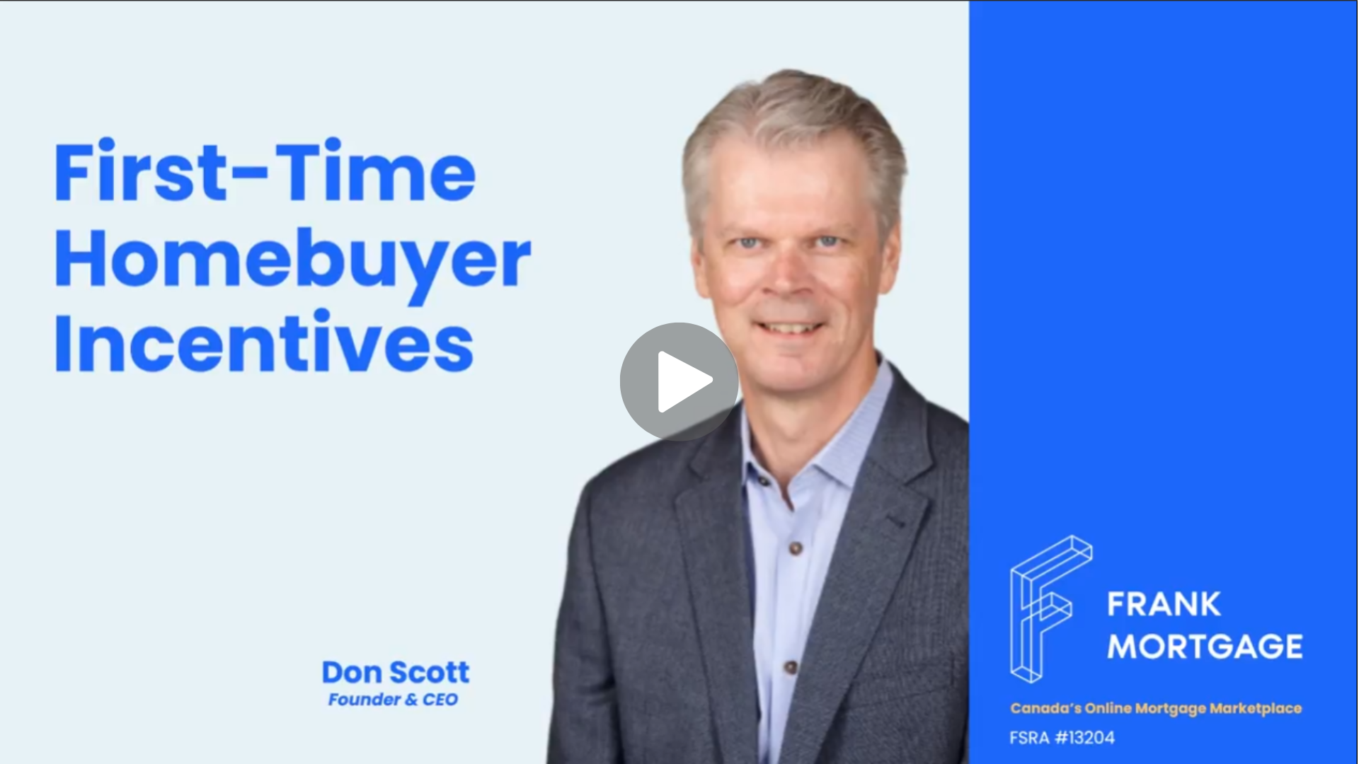 A man in a suit and tie is standing in front of a white background.