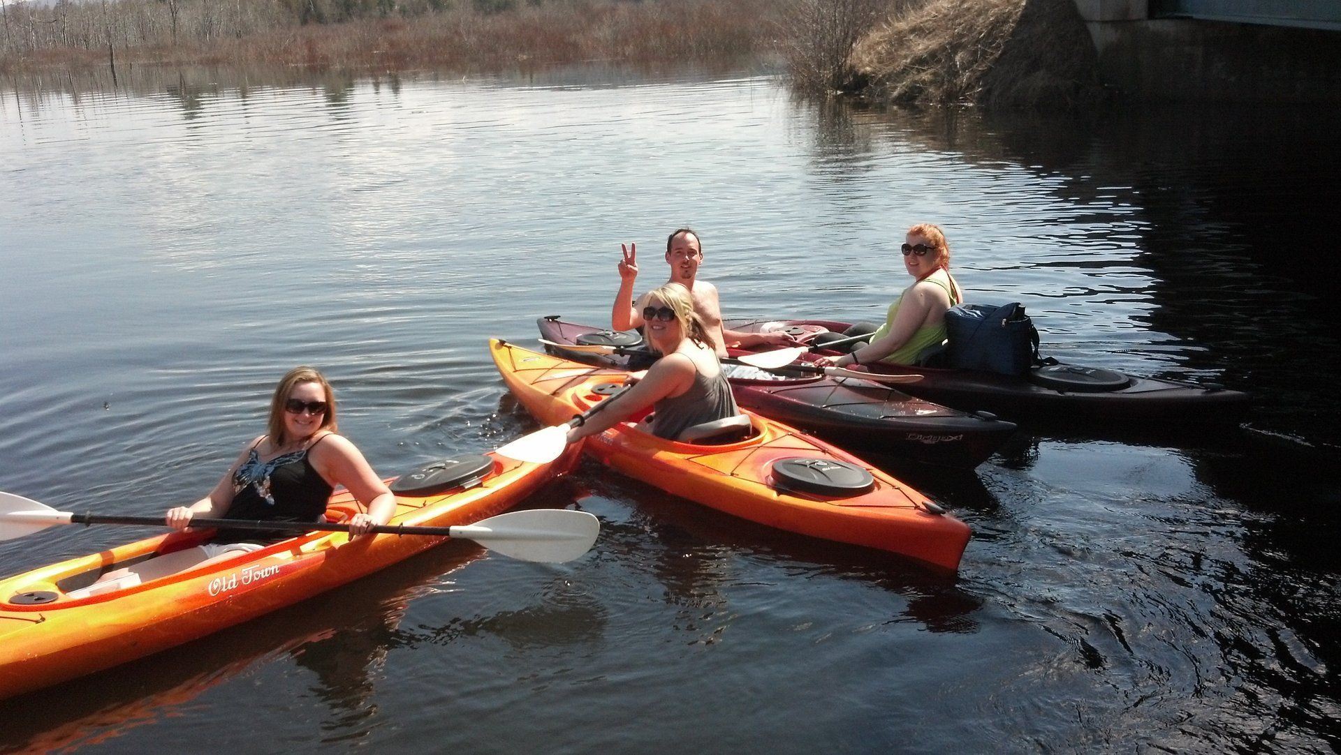 A group of people kayak the Clyde River with Vermont kayak rentals by Clyde River Recreation