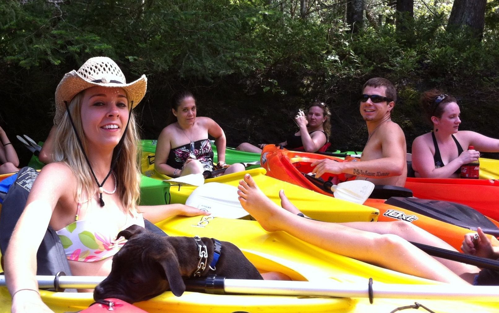 A group of young adults enjoy a day on the river with Vermont kayak rentals by Clyde River Recreation