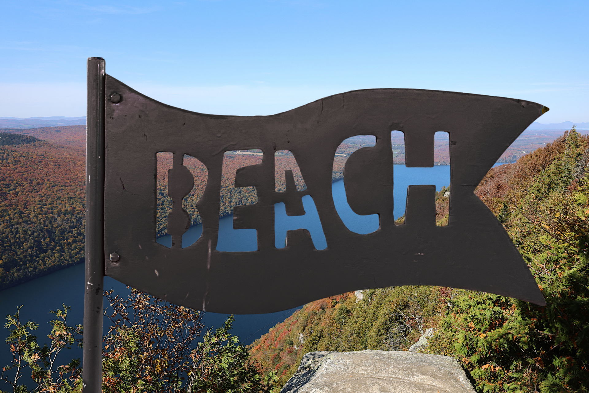 A beach sign, representing North Beach of Lake Willoughby