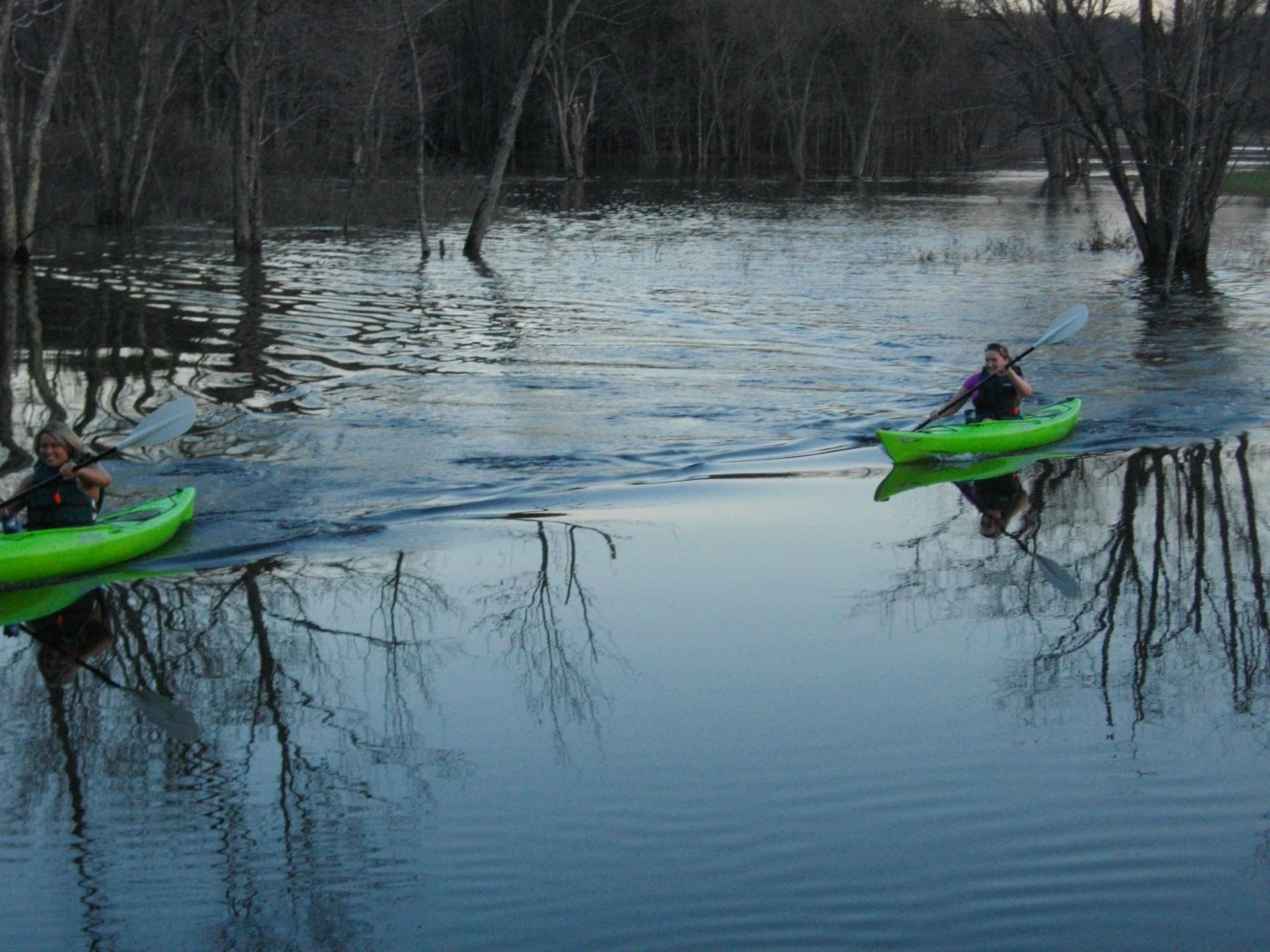 Two people kayaking on the scenic Clyde River in West Charleston, Vermont’s Northeast Kingdom on a s