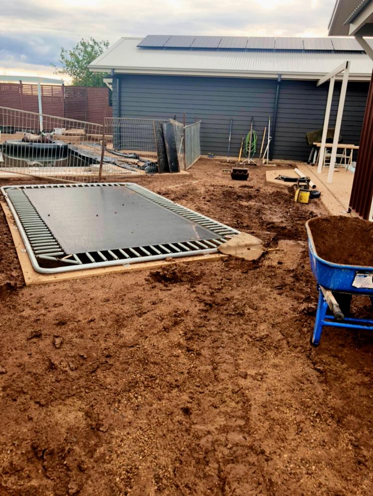 Residential Backyard With Trampoline Before — Landscaping Services in Dubbo, NSW